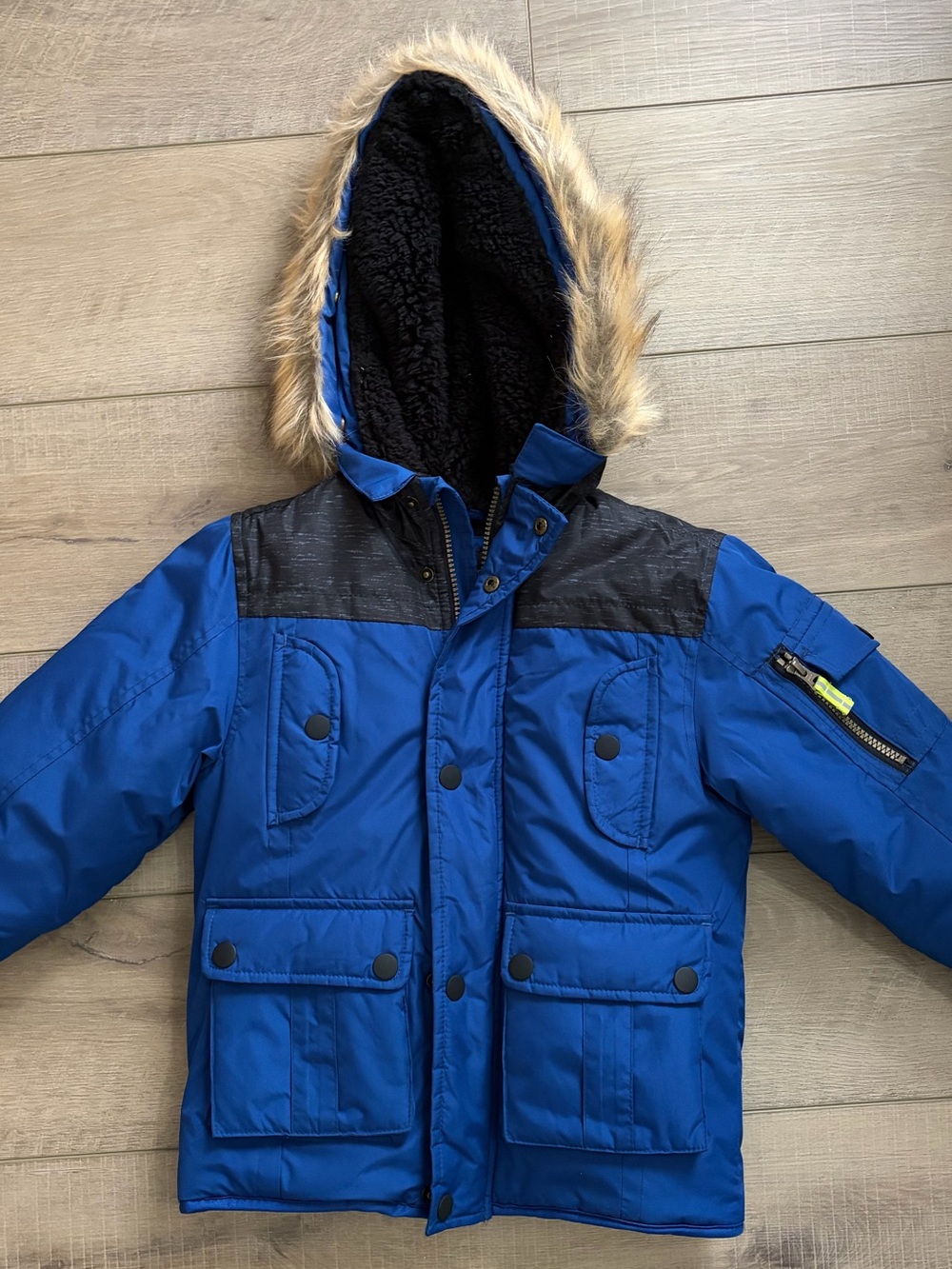 Youth winter coat, black and blue with fur hood